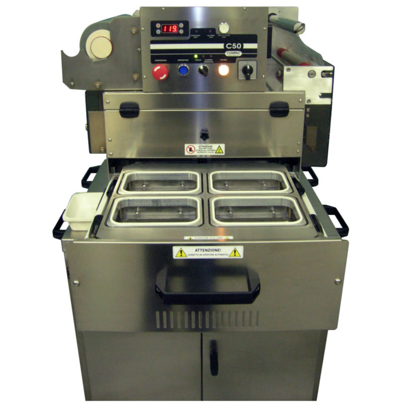 Macchina Termosaldatrice Compac C50CF con Formato Serie G a cassetto aperto